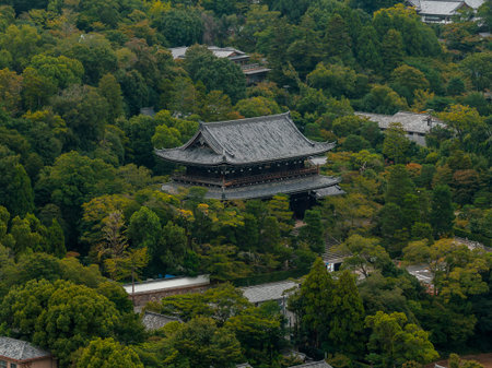 Aerial View of Traditional Japanese Temple in Kyotos Forested Landscapeの写真素材