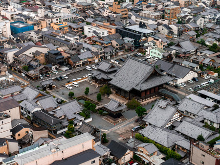 Aerial View of Kyoto with Traditional Temple and Urban Landscapeの写真素材