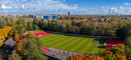 Aerial View of a Park in Riga with Autumn Foliage and Cityscapeの写真素材