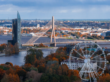 Aerial fall view of Vansu Bridge and Daugava River in Riga, Latviaの写真素材