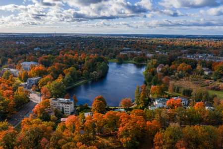 Aerial heart shaped park lake in Riga Latvia with autumn colorsの写真素材