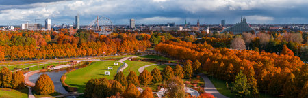 Aerial panorama of Riga park in golden autumn with city landmarksの写真素材
