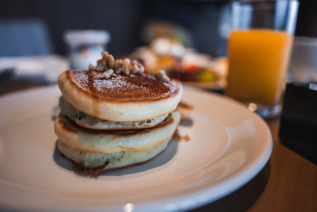 Gourmet pancakes with walnuts and sugar in a luxury hotel in Japanの写真素材