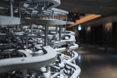 Layered metal sculpture with interlocking tracks in Japan interiorの写真素材