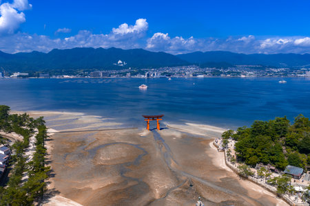 Aerial view of Great Torii at low tide on Miyajima, Hiroshima Bayの写真素材