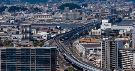 Aerial expressways and overpasses through Hiroshima toward the harborの写真素材