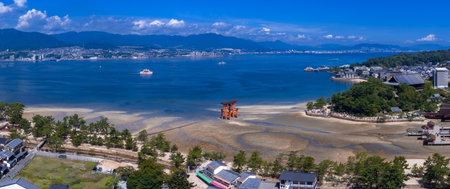 Aerial panorama of the Great Torii at low tide off Miyajima Islandの写真素材