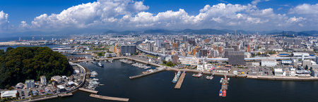 Aerial panorama of Hiroshima waterfront and bay with marinas and ferriesの写真素材