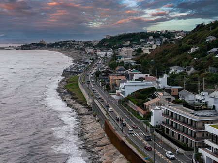Aerial view of Kamakura coast with Enoden rail and seaside roadの写真素材