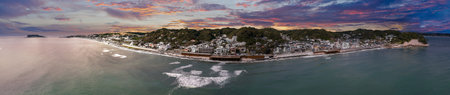 Aerial dusk panorama with Enoden by the seaの写真素材
