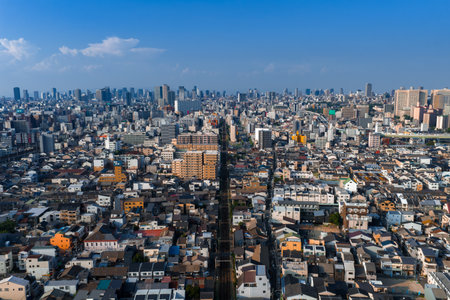 Aerial view of Osaka cityscape with railway line and Osaka Castleの写真素材