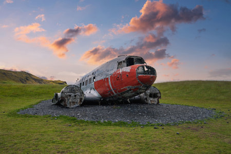DC 3 crash site fuselage on gravel near Vik at golden hourの写真素材