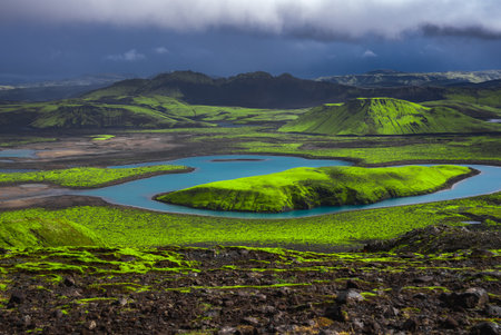 Moss island and turquoise water in Fjallabak near Landmannalaugarの写真素材