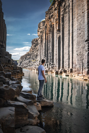 Studlagil Canyon basalt columns and river reflections in East Icelandの写真素材