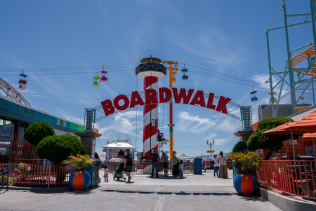 Santa Cruz Beach Boardwalk entrance with BOARDWALK arch and ridesの写真素材