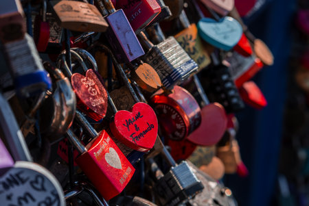 Close up of heart shaped love locks on fence in San Francisco