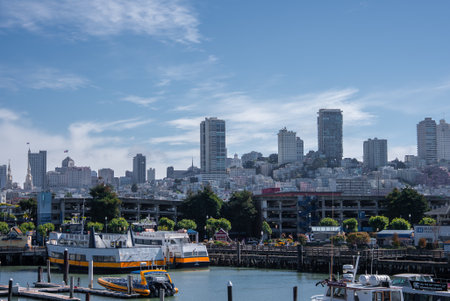 San Francisco waterfront with ferries, Coit Tower, and Transamerica Pyramid