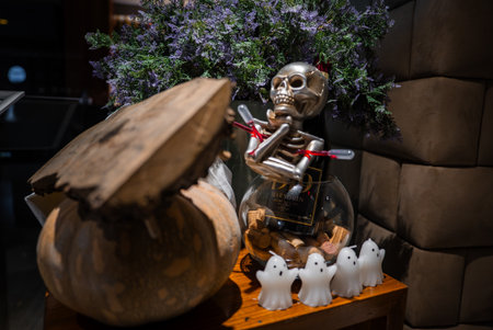 Halloween decor vignette in hotel lobby with ghostsの写真素材