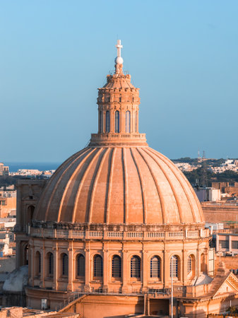 Basilica of Our Lady of Mount Carmel dome at sunset in Vallettaの写真素材