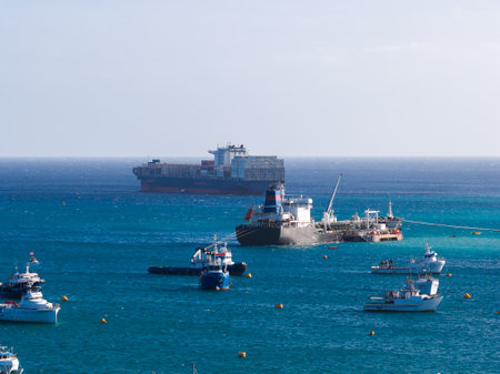Aerial panoramic view of Marsaxlokk harbor with fishing boats and ships