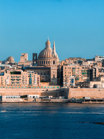 Valletta waterfront with cathedral dome and spire on Grand Harbourの写真素材