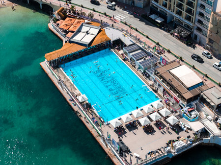 Aerial view of Sliema waterfront pool complex beside Mediterranean