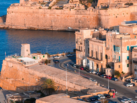 Aerial sunset view of Valletta Malta fortified waterfront and harborの写真素材