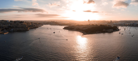 Aerial sunset panorama of Marsamxett Harbour, Valletta and Manoel Islandの写真素材