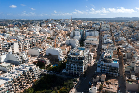 Aerial panoramic view of Mellieha Malta with rooftop pools and coastの写真素材