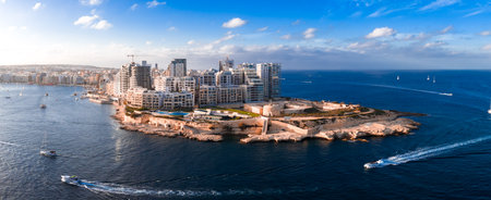 Aerial panorama of St. Julians and Sliema coastline in Malta at sunsetの写真素材