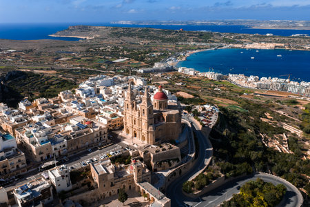 Aerial view of Mellieha with parish church and Mellieha Bay, Maltaの写真素材