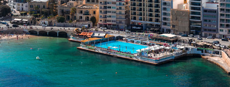 Aerial view of Sliema seafront lido and saltwater pool in Malta