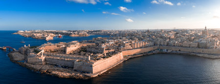 Aerial panorama of Valletta Malta at sunset with bastion walls and harboursの写真素材