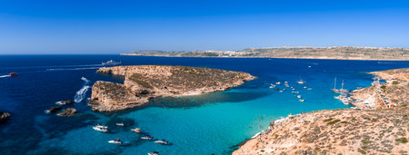 Aerial panorama of Blue Lagoon on Comino Island, Malta at middayの写真素材