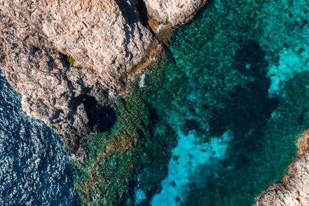 Aerial view of Blue Lagoon cliffs and waters, Comino Island, Maltaの写真素材