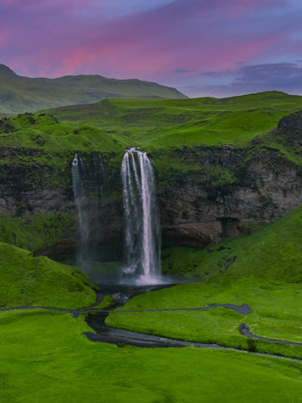 Seljalandsfoss waterfall at twilight, southern Iceland, Ring Roadの写真素材