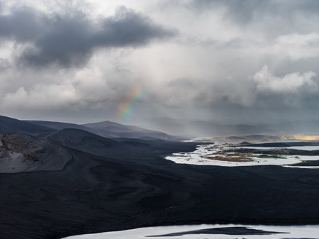 Aerial view of Iceland volcanic highlands with rivers and rainbowの写真素材