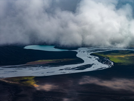 Aerial glacial river and turquoise lake in Icelandic highlandsの写真素材