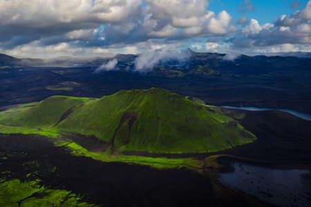 Aerial volcanic crater in Landmannalaugar with moss and red scoriaの写真素材