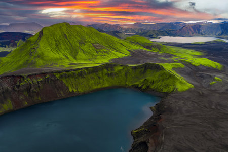 Aerial moss ridge around blue crater lake in Iceland highlandsの写真素材