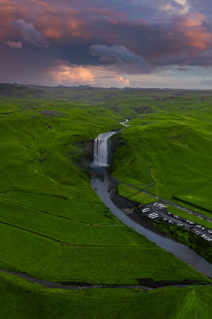 Aerial view of Skogafoss waterfall and gorge in southern Icelandの写真素材