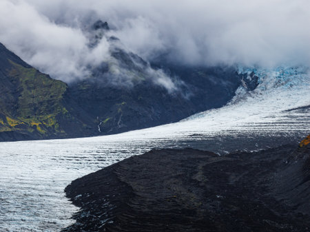 Glacier descending a volcanic slope in Vatnajokull National Park, Icelandの写真素材