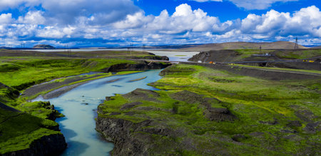 Aerial view of Sigoldugljufur river, bridge, and lava fields in Iceland