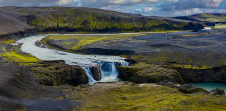 Aerial glacial river and waterfall in Icelands Landmannalaugarの写真素材