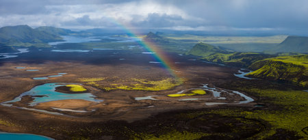 Aerial panorama of Landmannalaugar highlands with rivers and rainbowの写真素材