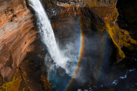 Aerial view of Haifoss waterfall with double rainbow in Icelandの写真素材