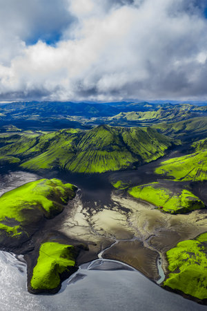 Aerial Iceland highlands with mossy ridges and braided riversの写真素材