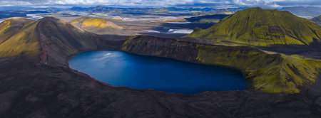 Aerial crater lake and volcanic ridges in Icelands Highlandsの写真素材