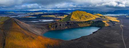 Aerial crater lake in Iceland Highlands with lava fields and ridgesの写真素材