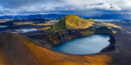 Aerial view of a turquoise crater lake in Icelands Highlandsの写真素材
